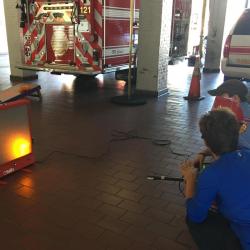 child using extinguish simulator 